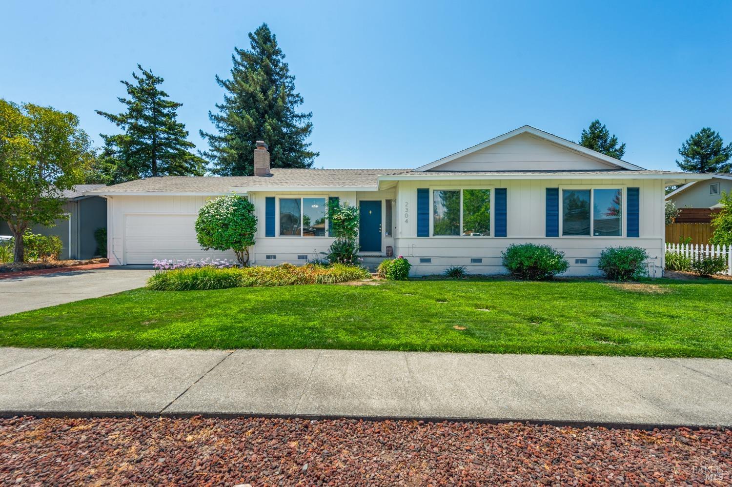 2304 Sundance Street Santa Rosa, CA 95403 - Photo 1 of 1 a front view of a house with a garden and yard