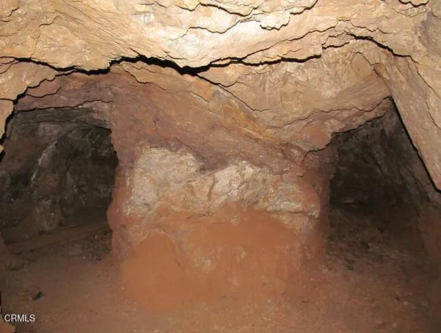 a view of a large building with a yard