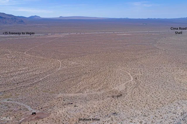 a green field with an outdoor space