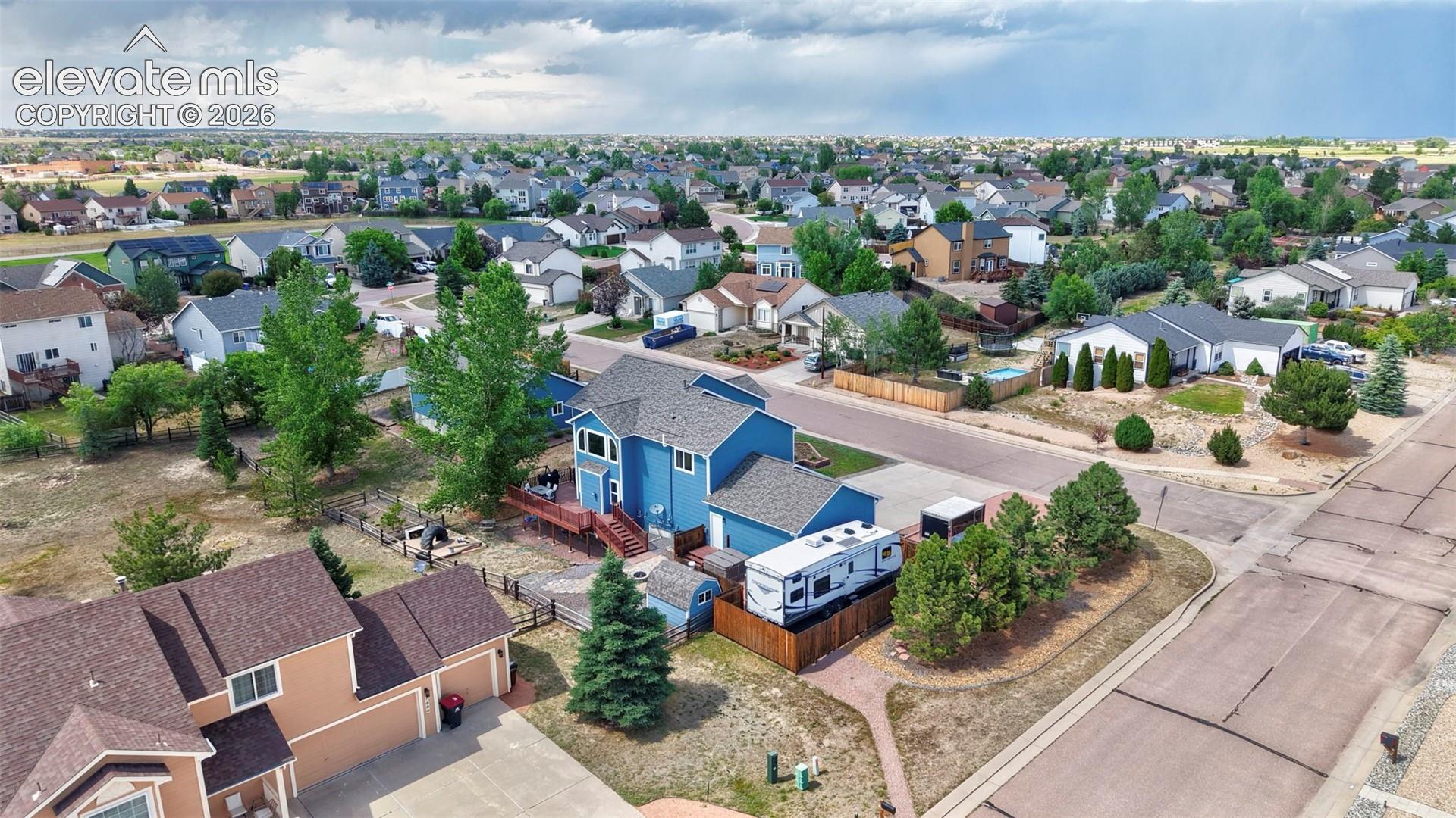 12571 Scamper Road Peyton, CO 80831 - Photo 40 of 49 East Side Yard, Mature Pines & RV Parking