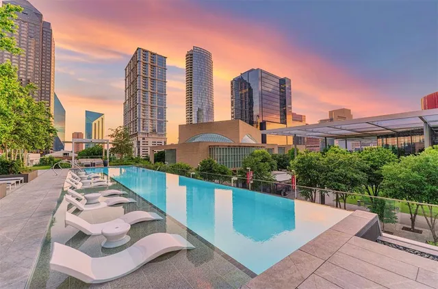 a view of a city with tall buildings