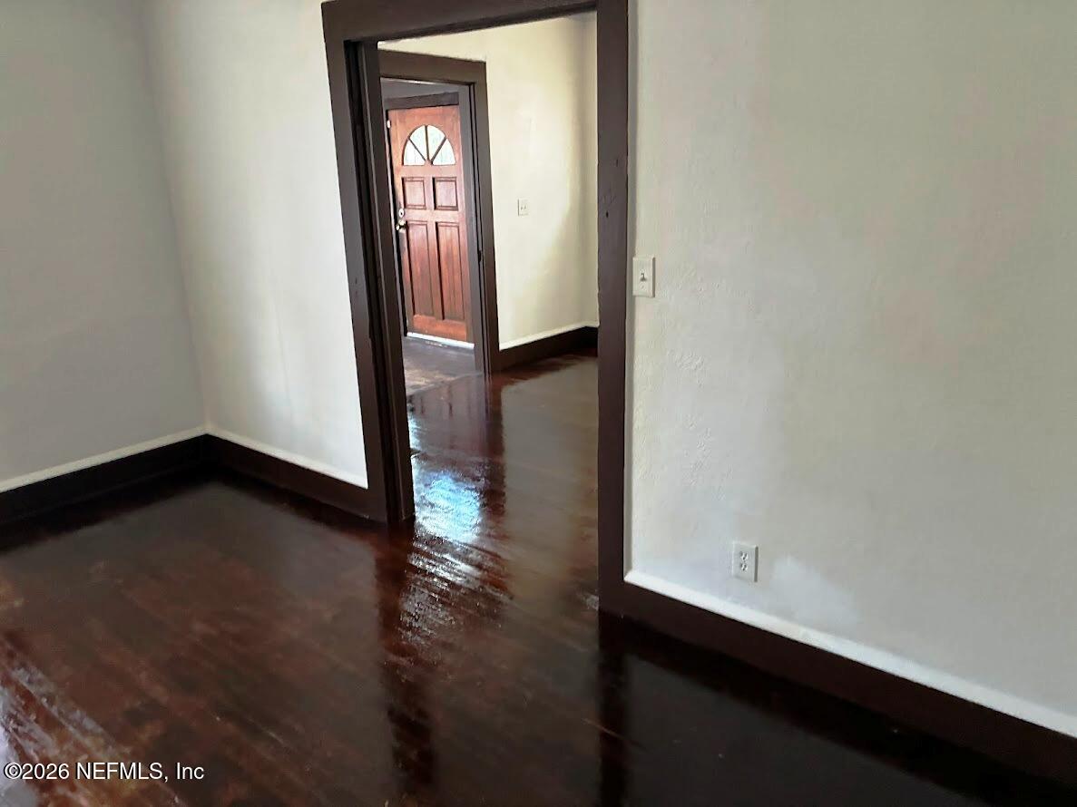 2036 Moncrief Road Jacksonville, FL 32209 - Photo 6 of 32 a view of an entryway with wooden floor