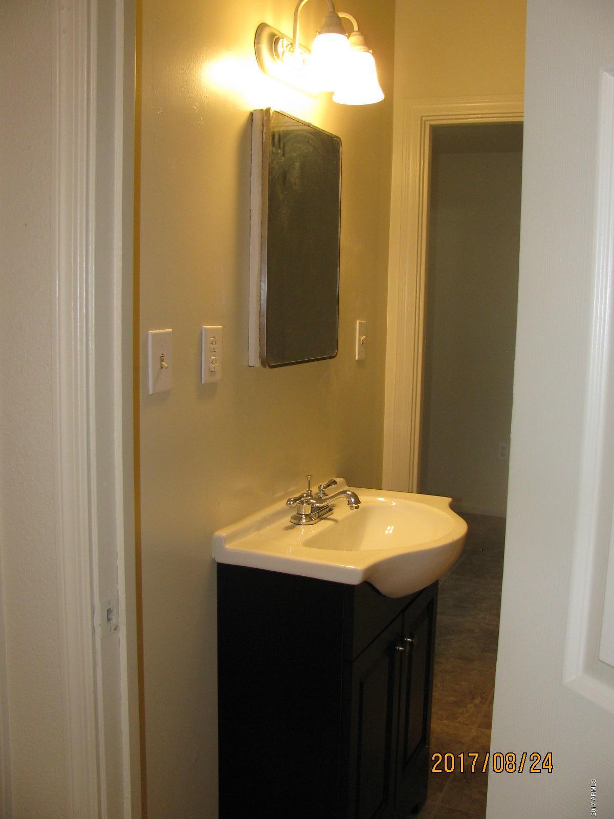 3041 West Granada Road Phoenix, AZ 85009 - Photo 20 of 26 GUEST BATH WITH NEW VANITY & LIGHTING