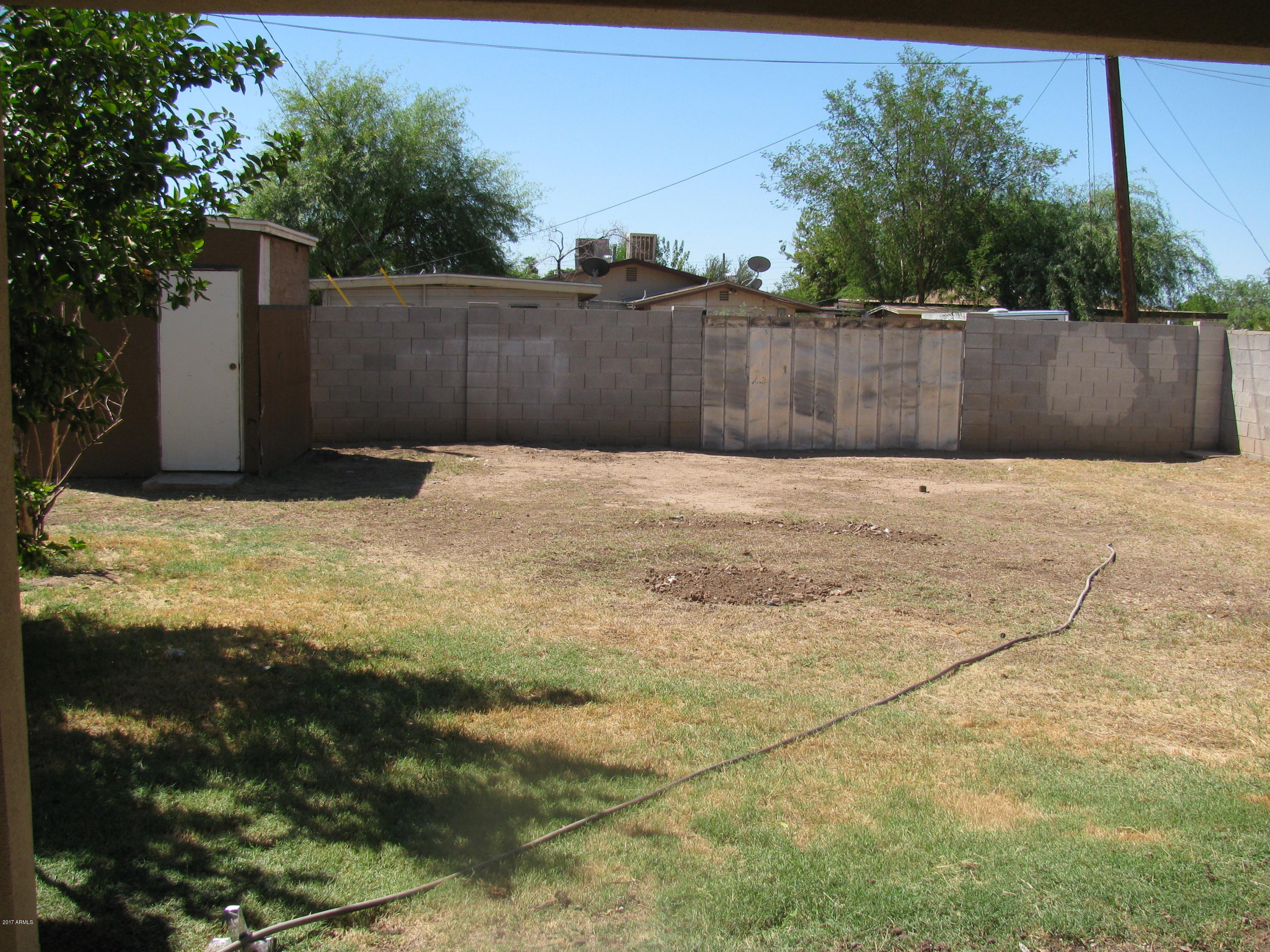 3041 West Granada Road Phoenix, AZ 85009 - Photo 4 of 26 HUGE FULLY BLOCK FENCED BACKYARD WITH DB