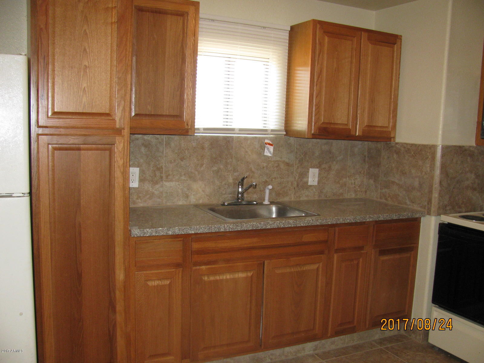 3041 West Granada Road Phoenix, AZ 85009 - Photo 6 of 26 NEW CABINETS, GRANITE AND BACKSPLASH