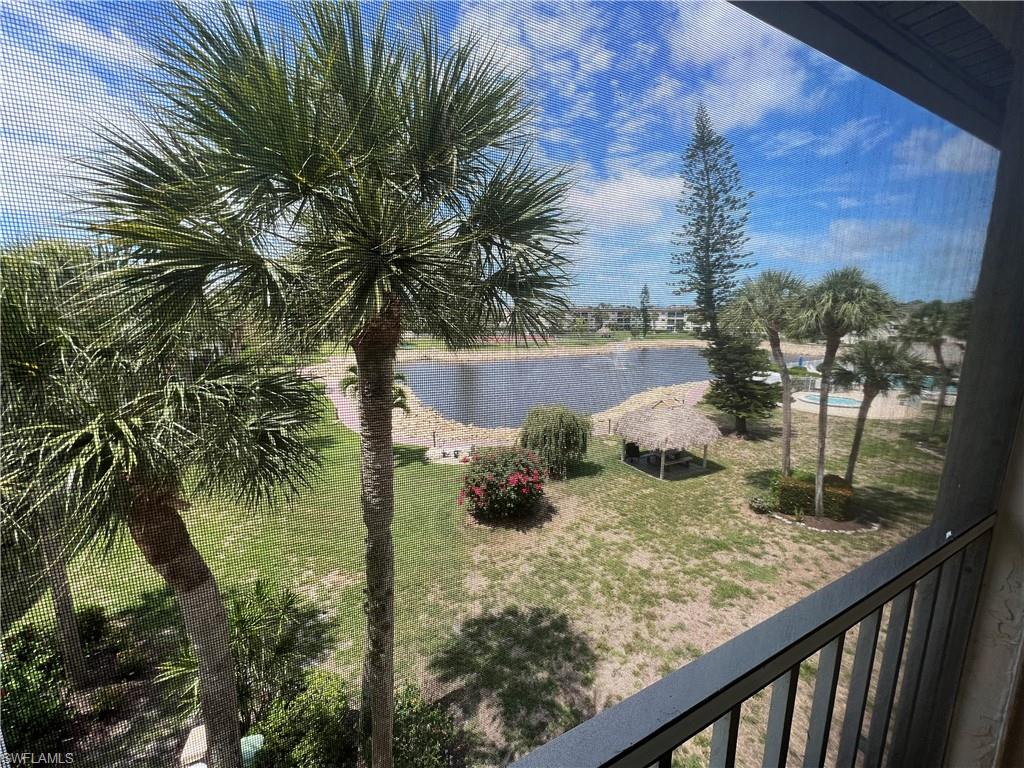 a view of a backyard of the house