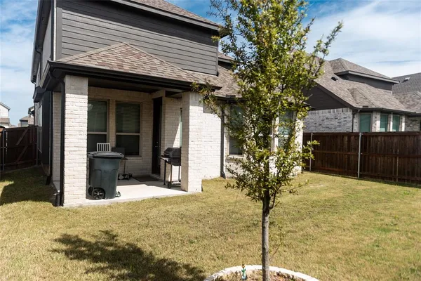 a house view with a outdoor space