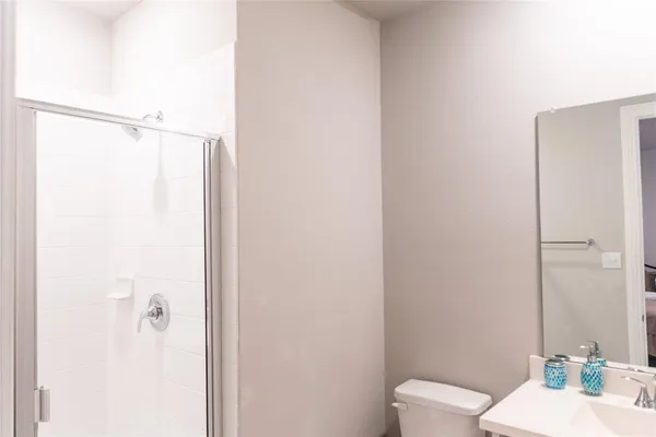 a bathroom with a shower curtain