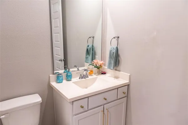a bathroom with a sink and a toilet