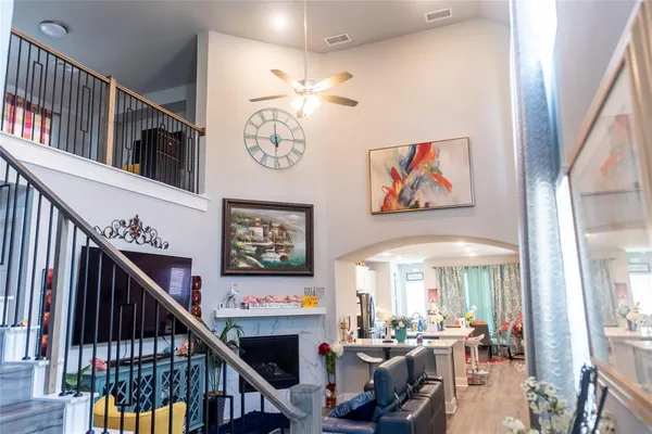 a view of a hallway with furniture and entryway