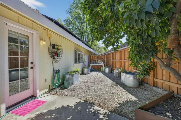 a backyard of a house with seating space