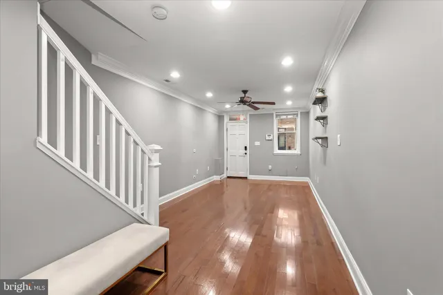 a view of entryway with wooden floor