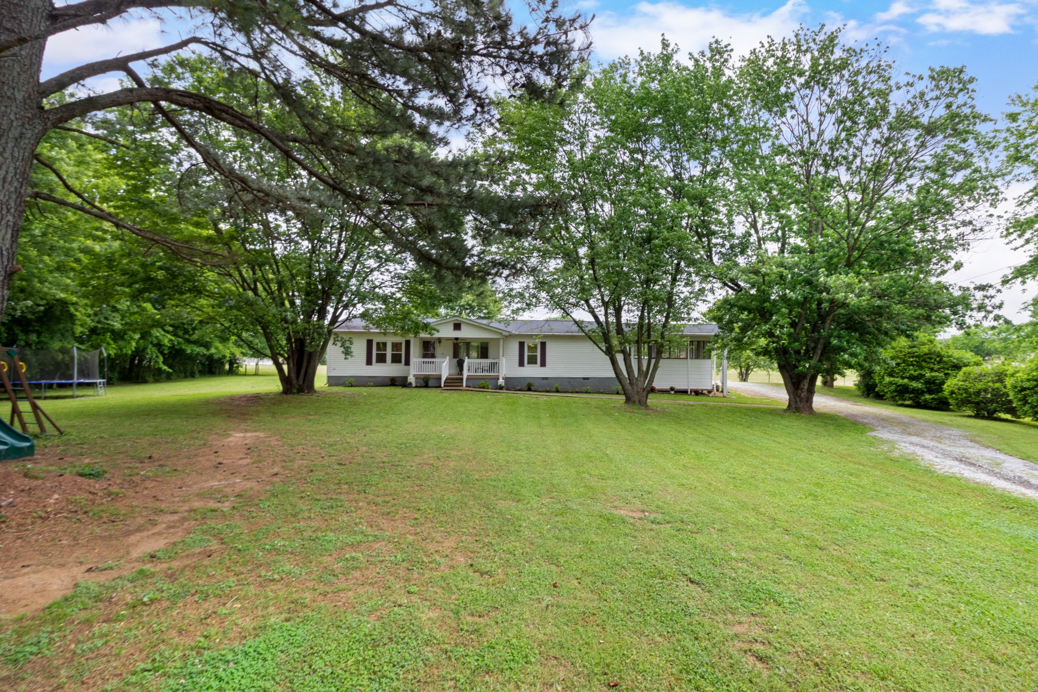 5674 Lakeview Road Springfield, TN 37172 - Photo 15 of 54 a front view of a house with a yard