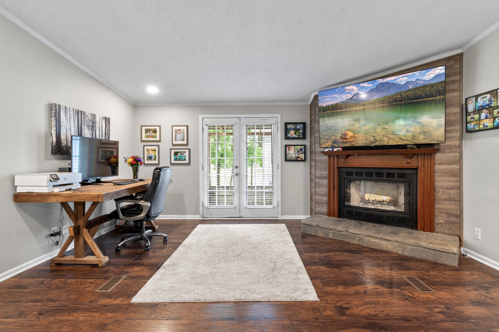 5674 Lakeview Road Springfield, TN 37172 - Photo 23 of 54 a workspace with furniture fire place and a fireplace