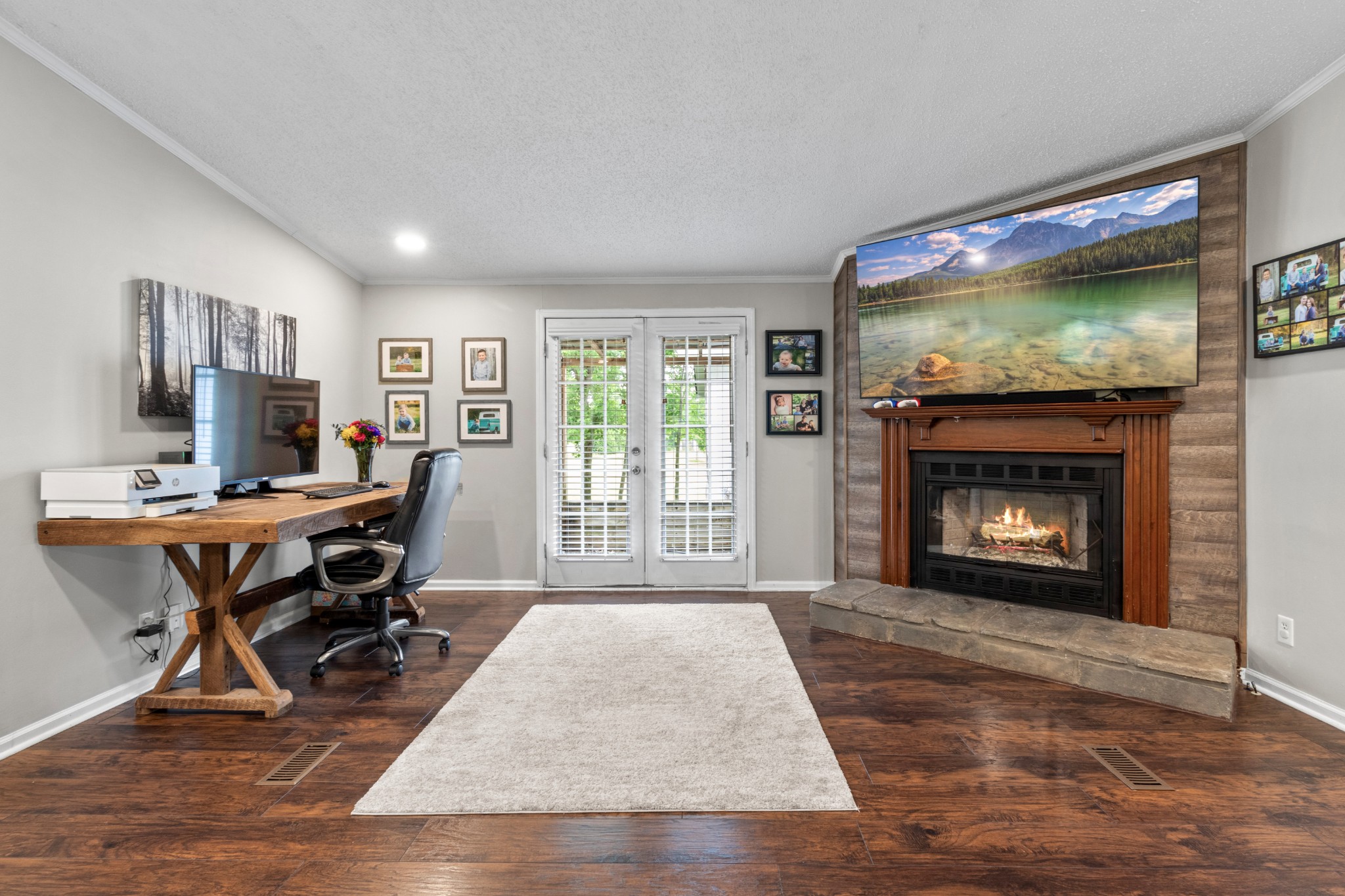 5674 Lakeview Road Springfield, TN 37172 - Photo 24 of 54 a workspace with furniture fire place and a fireplace