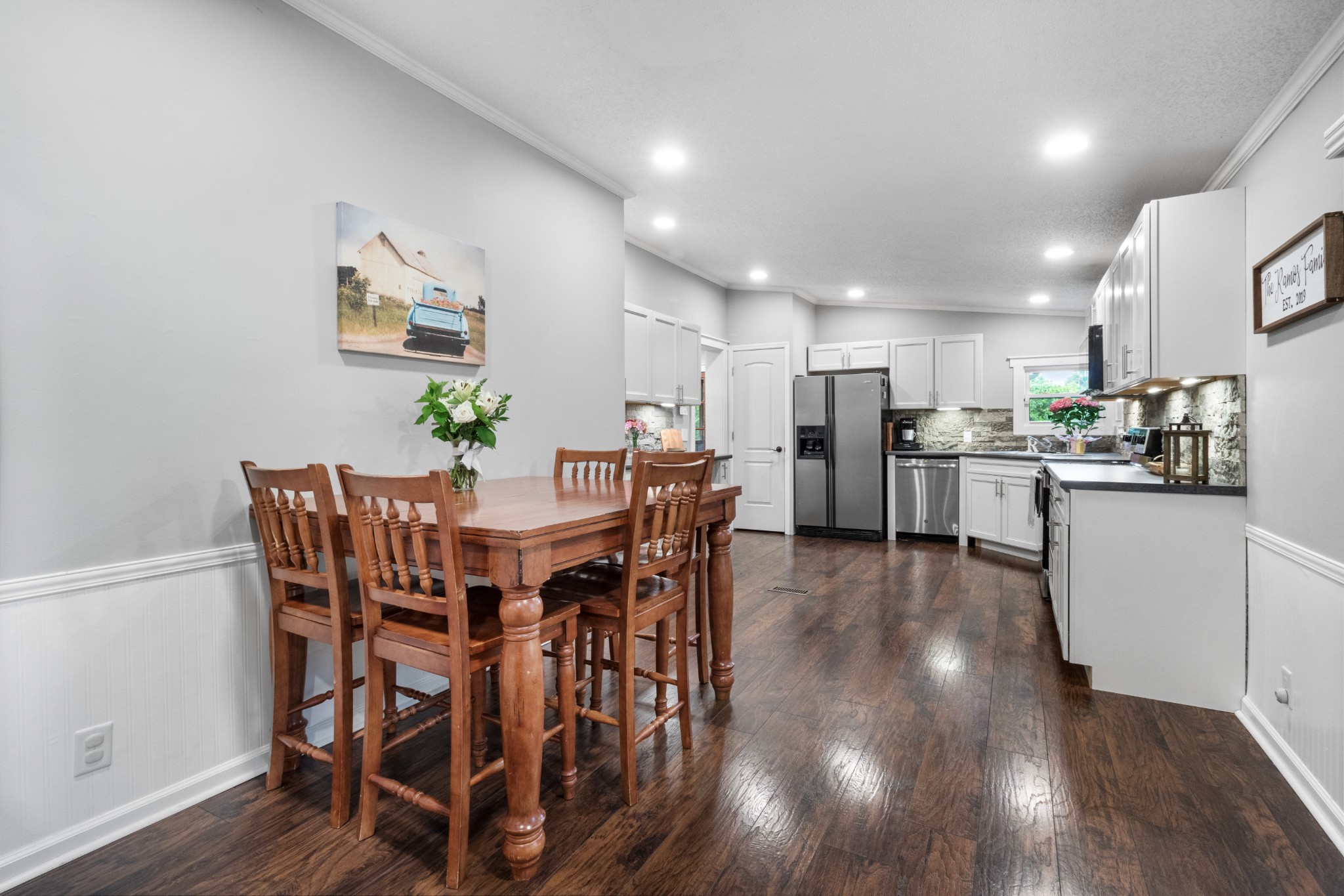 5674 Lakeview Road Springfield, TN 37172 - Photo 32 of 54 a view of a dining room with furniture and wooden floor