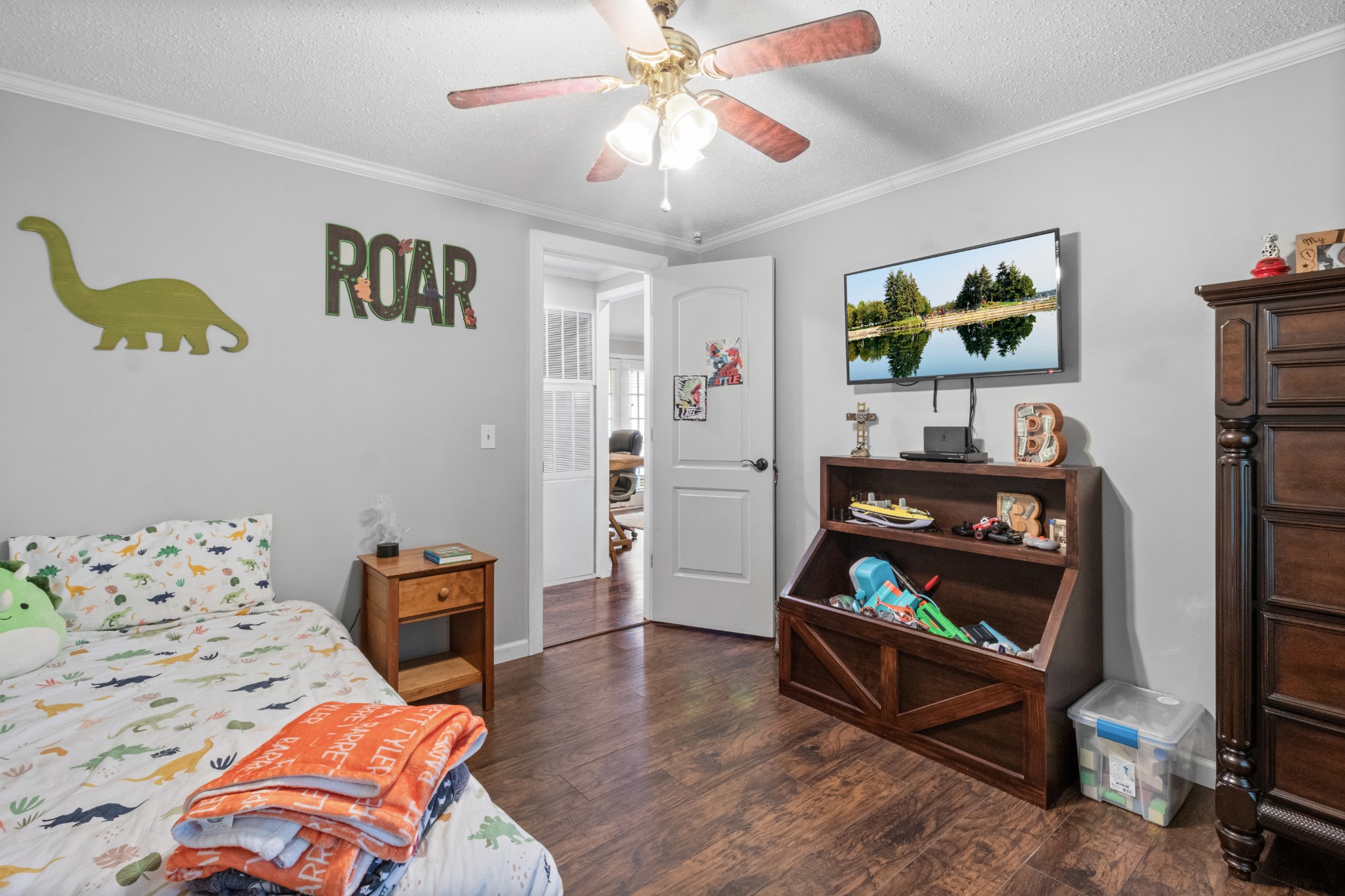 5674 Lakeview Road Springfield, TN 37172 - Photo 46 of 54 a bedroom with furniture and a wooden floor