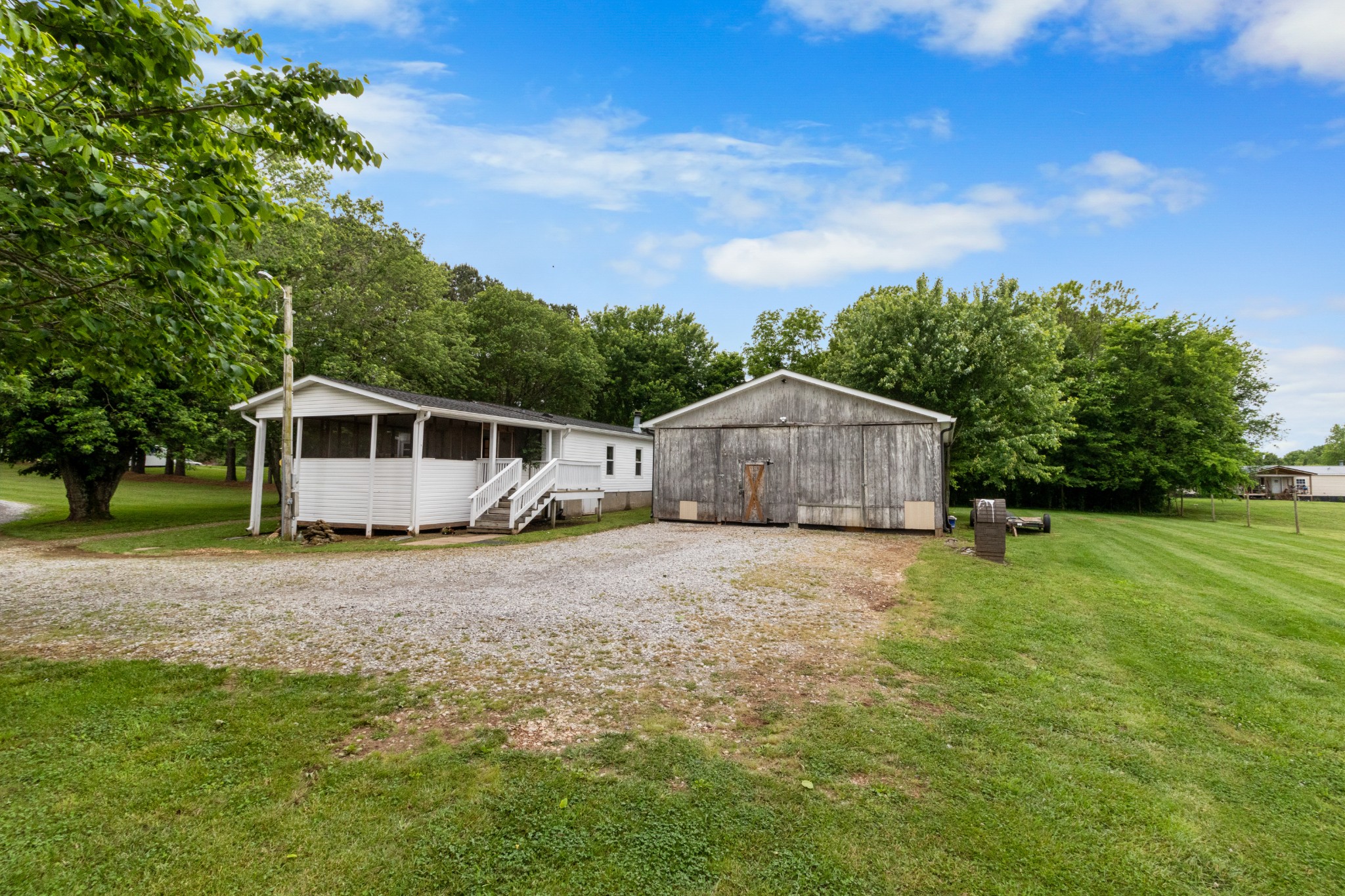 5674 Lakeview Road Springfield, TN 37172 - Photo 54 of 54 a house with trees in the background