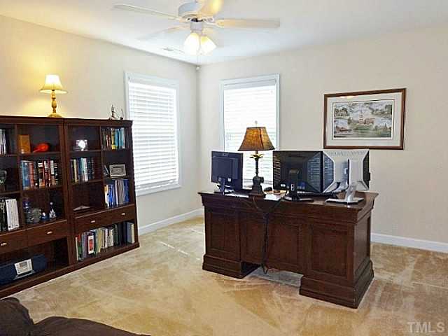 3212 Queensland Road Raleigh, NC 27614 - Photo 16 of 25 Need a home office space. Turn one of the bedrooms into your work area. This room has views of the back yard. It also has a large double door closet.