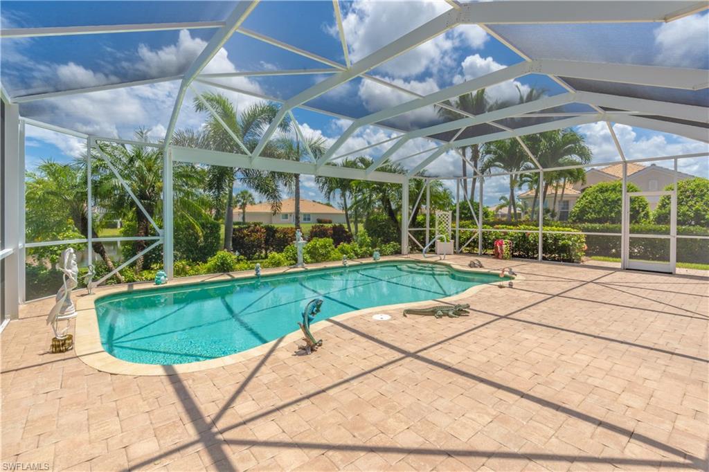 8883 Ravello Court Naples, FL 34114 - Photo 29 of 35 View of pool with a lanai and a patio
