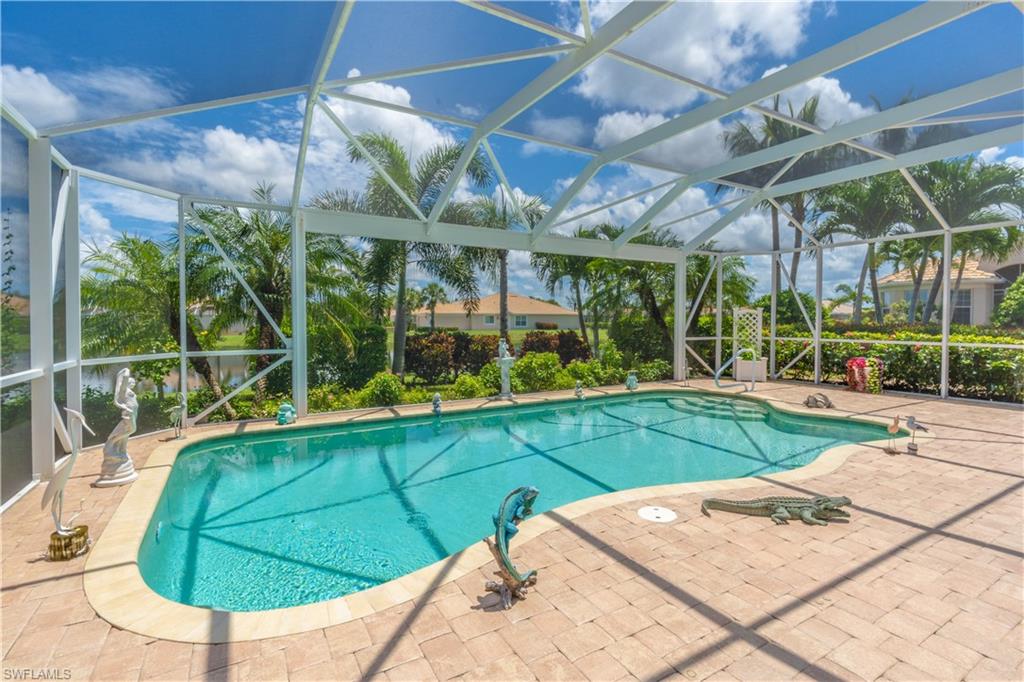 8883 Ravello Court Naples, FL 34114 - Photo 30 of 35 View of pool featuring a lanai and a patio area