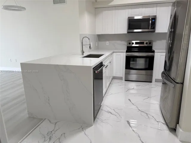 $530,000 | 888 Douglas Road, Unit 1502, Coral Gables, FL 33134