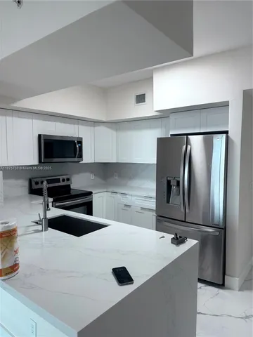 $530,000 | 888 Douglas Road, Unit 1502, Coral Gables, FL 33134