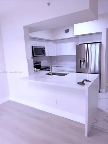 $530,000 | 888 Douglas Road, Unit 1502, Coral Gables, FL 33134