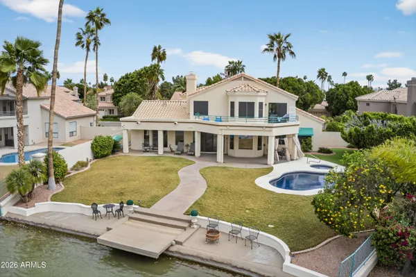 a aerial view of a house with swimming pool