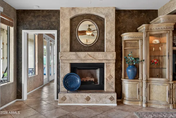 a kitchen with stainless steel appliances granite countertop wooden cabinets a stove a sink and a dishwasher