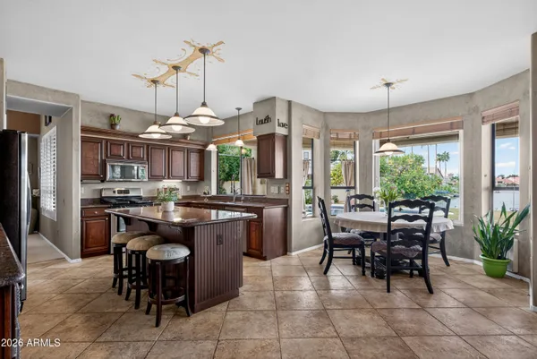 a kitchen with a sink and a window