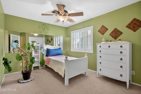 a view of a swimming pool with an outdoor space and seating area