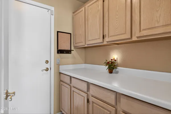 a view of a house with swimming pool and a yard