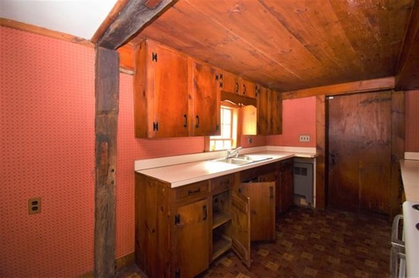 8 Old Coach Road Kingston, NH 03848 - Photo 21 of 27 a bathroom with a sink and a mirror