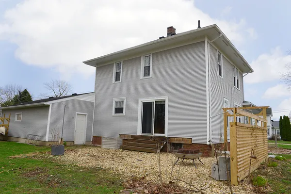 a view of swimming pool outdoor seating and yard