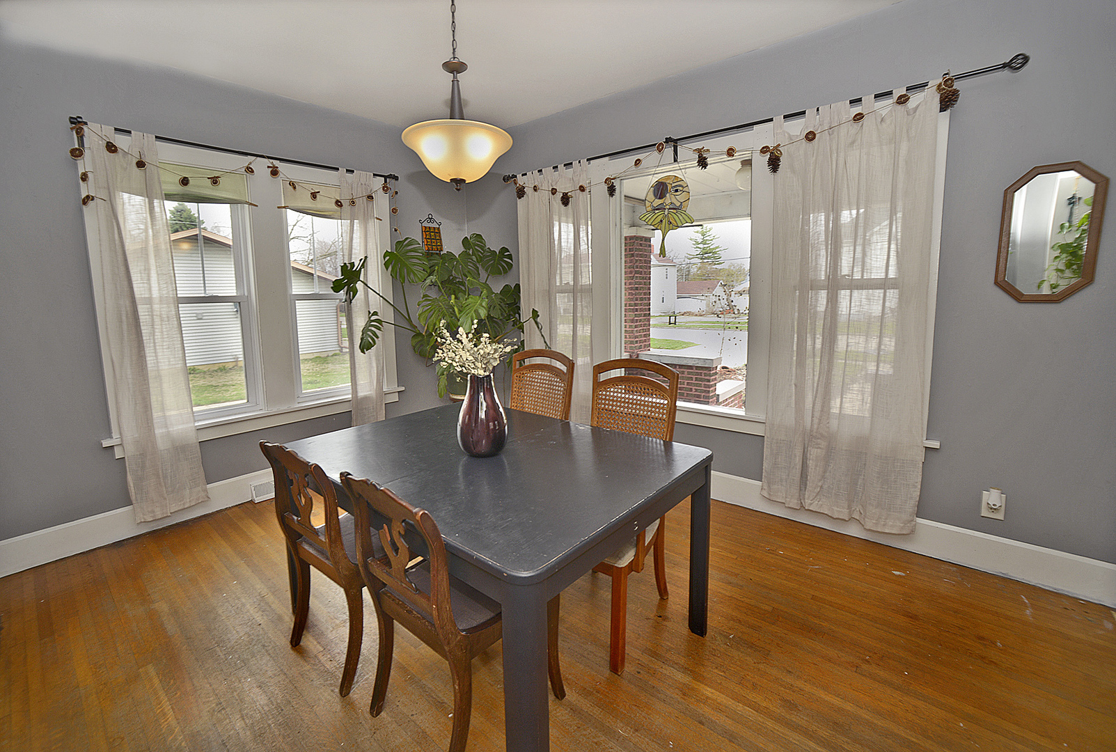 210 6th Street Mendota, IL 61342 - Photo 5 of 27 a view of a dining room with furniture window and wooden floor