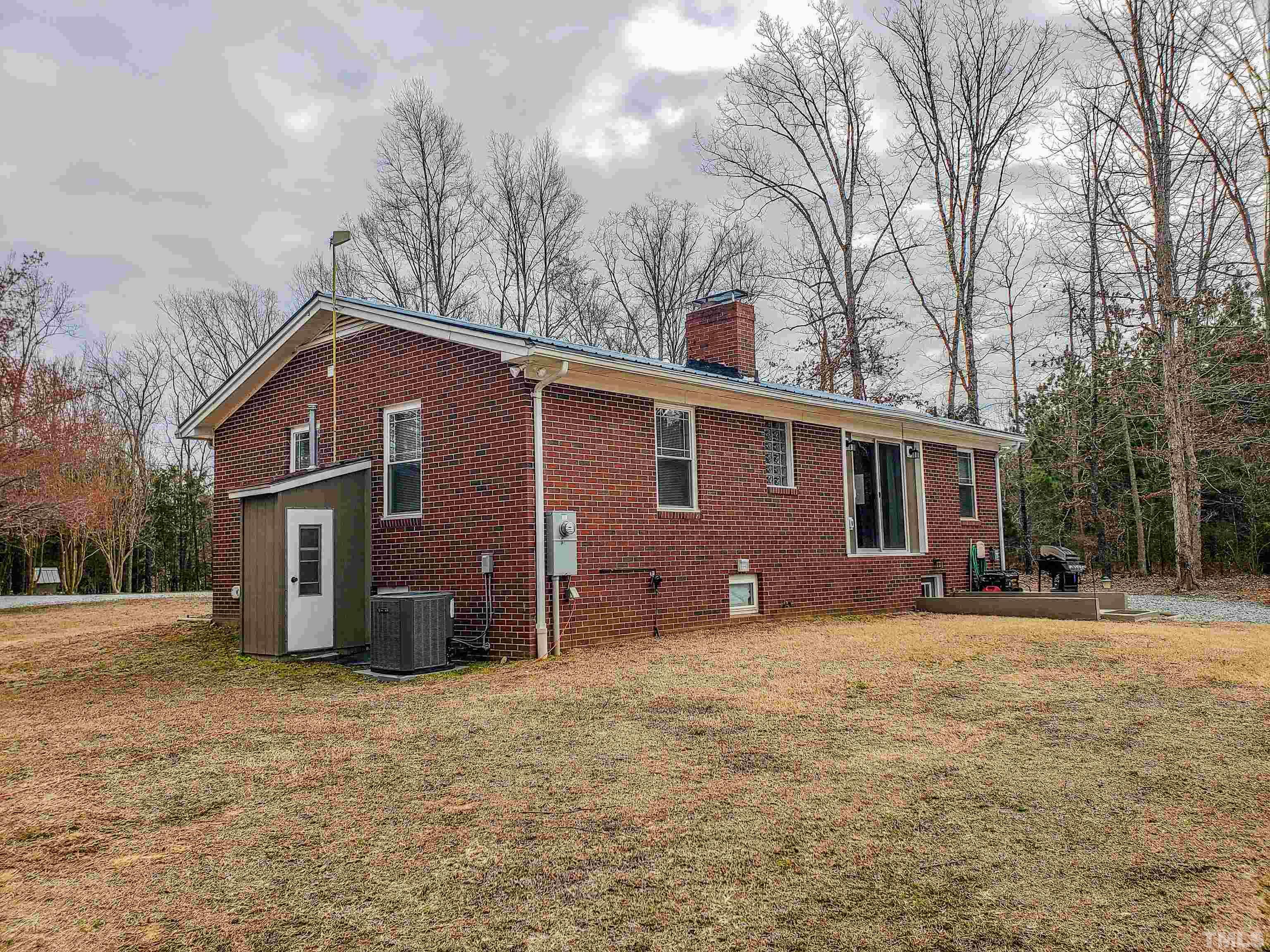 155 Alva Oakley Road Roxboro, NC 27574 - Photo 41 of 42 a front view of a house with a yard
