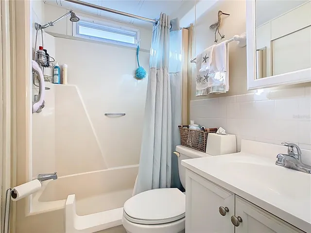 a bathroom with a sink and toilet