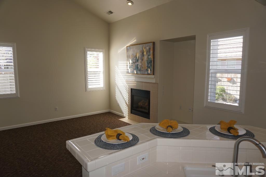1611 Quail Bar Court Reno, NV 89521 - Photo 5 of 17 a view of table and a fire pit