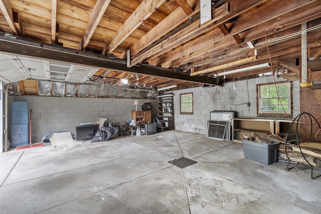22 Haynes Road Townsend, MA 01469 - Photo 17 of 24 a view of a garage with chairs