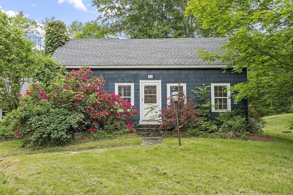 22 Haynes Road Townsend, MA 01469 - Photo 19 of 24 a front view of house with yard and trees around