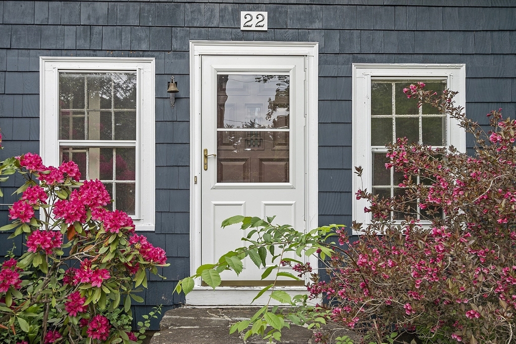 22 Haynes Road Townsend, MA 01469 - Photo 20 of 24 a view of a potted plant sitting in front of a house