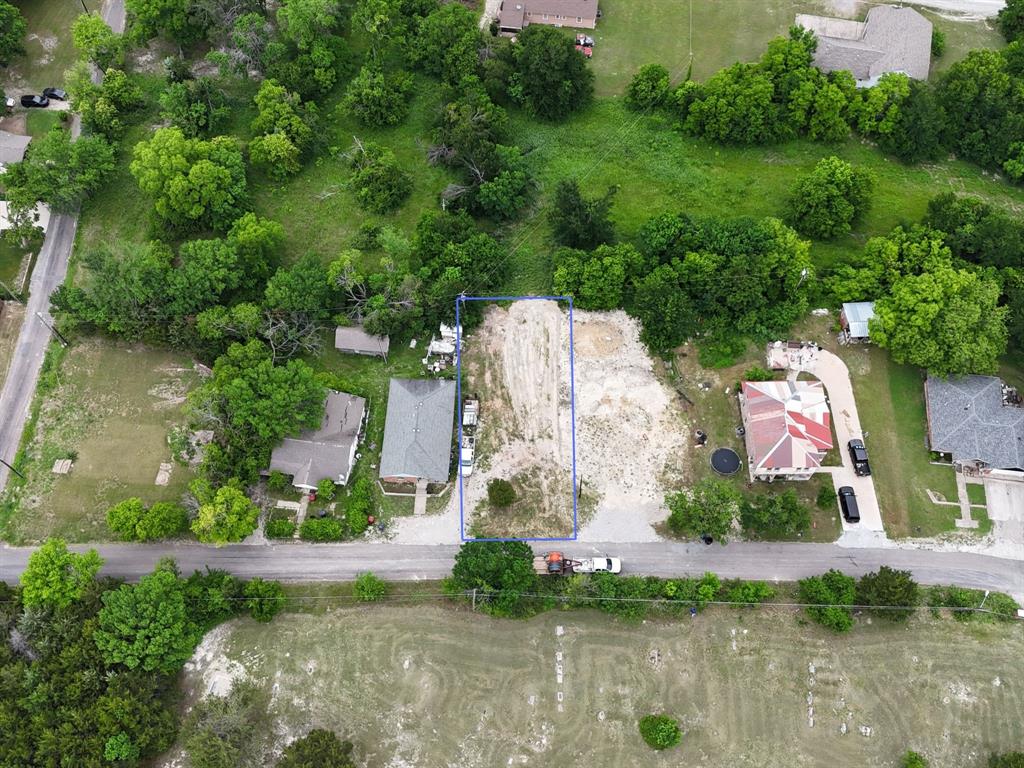 Tbd East Fulton Street Van Alstyne, TX 75495 - Photo 8 of 12 an aerial view of residential houses with outdoor space and swimming pool