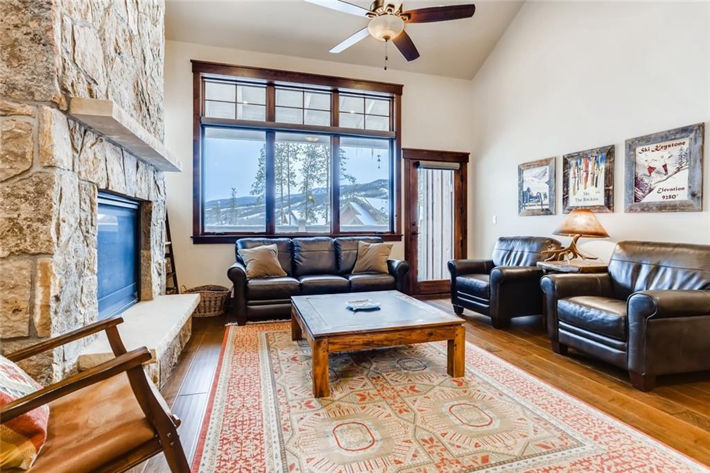 867 Independence Road, Unit 4A Keystone, CO 80435 - Photo 1 of 28 a living room with furniture and a fireplace