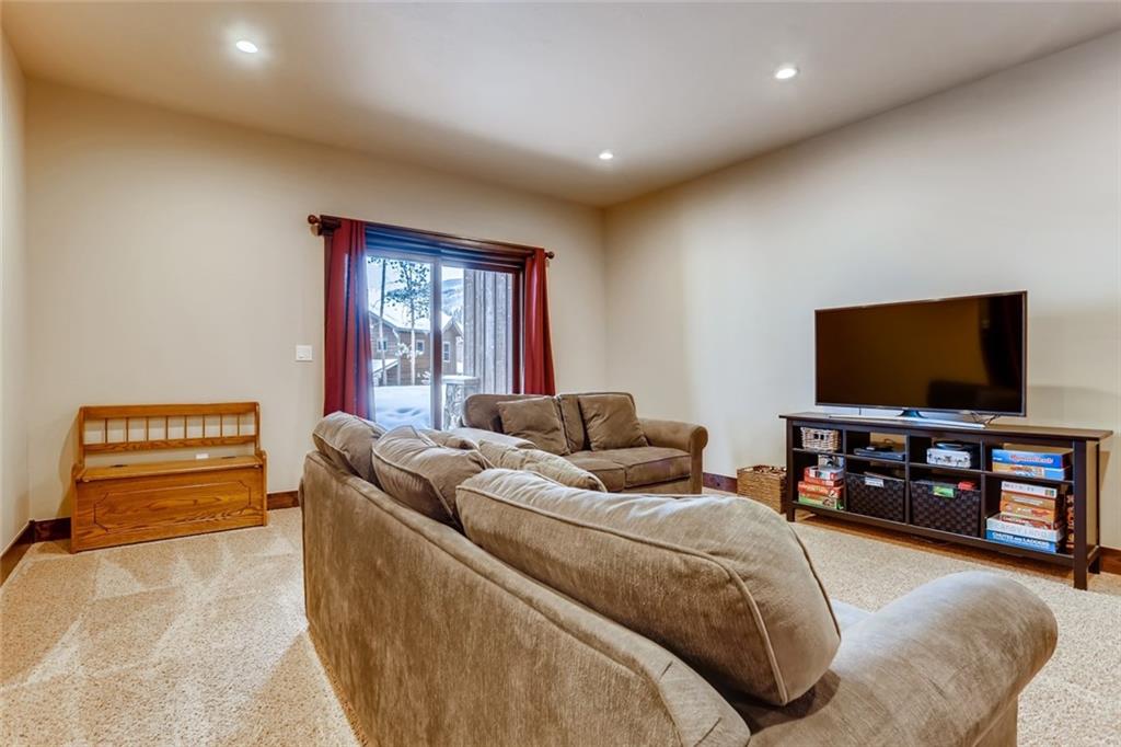 867 Independence Road, Unit 4A Keystone, CO 80435 - Photo 2 of 28 a bedroom with a bed and flat screen tv