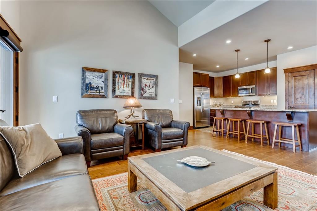 867 Independence Road, Unit 4A Keystone, CO 80435 - Photo 16 of 28 a living room with furniture kitchen and a table