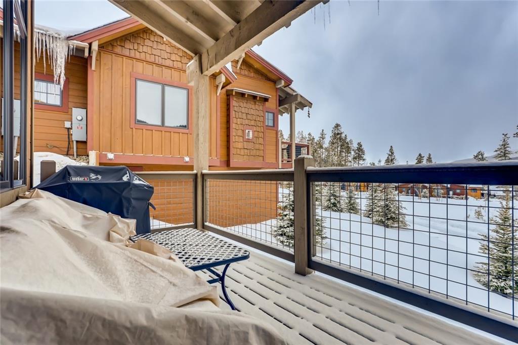 867 Independence Road, Unit 4A Keystone, CO 80435 - Photo 21 of 28 a view of balcony with wooden floor and fence