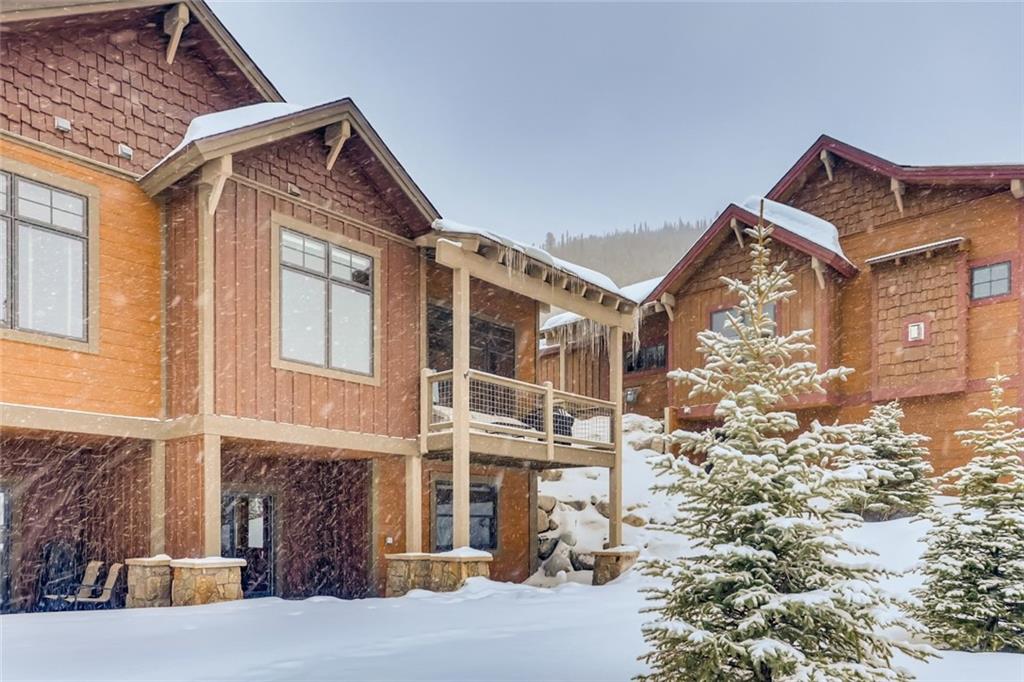 867 Independence Road, Unit 4A Keystone, CO 80435 - Photo 23 of 28 a front view of a house with a yard