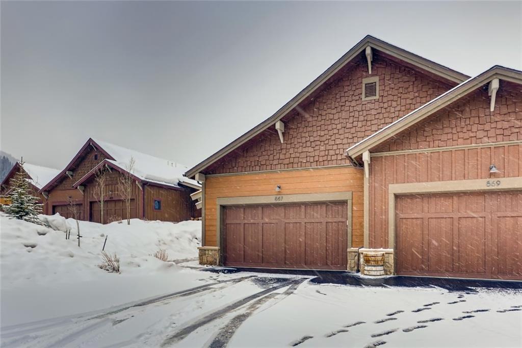 867 Independence Road, Unit 4A Keystone, CO 80435 - Photo 26 of 28 a front view of a house with a yard