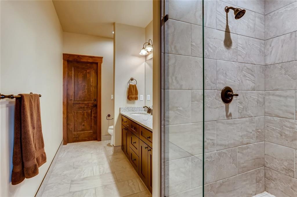 867 Independence Road, Unit 4A Keystone, CO 80435 - Photo 10 of 28 a bathroom with a sink and a mirror